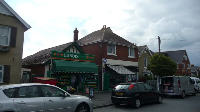 The Londis convenience store on Worsley Road, Gurnard , Isle of Wight . A very well used shop, it is still known by the locals as "Dow's", with that being the name of the original owner. I believe the shop is still owned by the family, but operates under a franchise agreement with Londis, as all Lon. Six contracts around a franchise purchase that deserve a separate reading