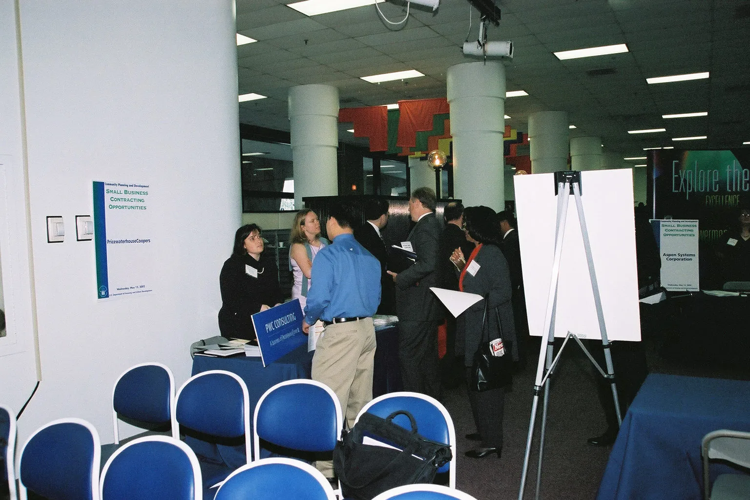 The original finding aid described this photograph as: Event: Small Business Contracting Opportunities Conference Subject Description: Office of Community Planning and Development-sponsored conference on small business contracting opportunities, in HUD Headquarters cafeteria. Creator: Ed Bradham--HU