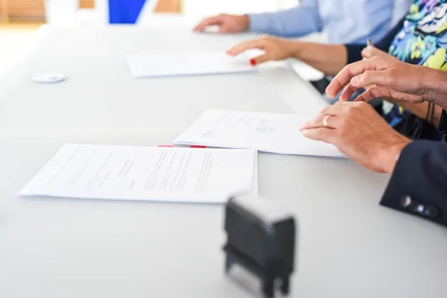 agreement, contract signing, table, hands, sign, contract, paper, paper work, meeting, business, closeup, agreement, contract, contract, contract, contract, contract. Franchise opportunities strategy framework for buyers